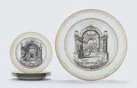 CIRCA 1740 A LARGE GRISAILLE AND GILT MARRIAGE DISH FOR THE DUTCH MARKET; AND FOUR PLATES, SIMILAR